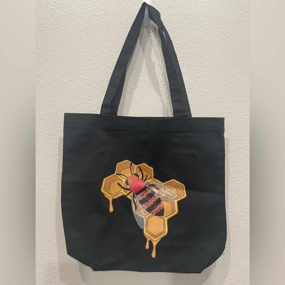 Beautiful Bee on honeycombs tote bag